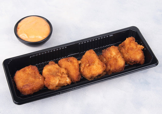 Crispy chicken nuggets from Heeran Al Dar Cafeteria, tender and golden-fried, perfect for a delicious meal.