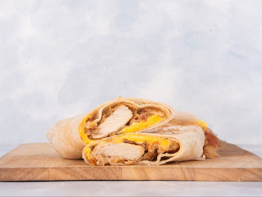 Delicious Grilled Chicken Wrap from Heeran Al Dar Cafeteria, featuring fresh grilled chicken, crisp vegetables, and a special homemade sauce wrapped in soft bread. Perfect for a tasty meal, this Chicken, Grilled, Wrap offers a delightful culinary experience.