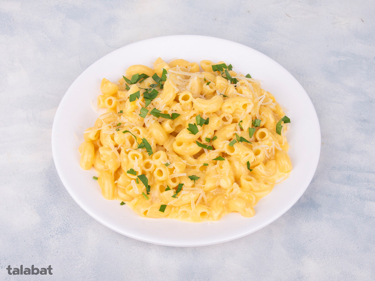 Delicious Noodles & Pasta dish including creamy cheesy macaroni noodles, showcasing the quality ingredients and bold flavors.